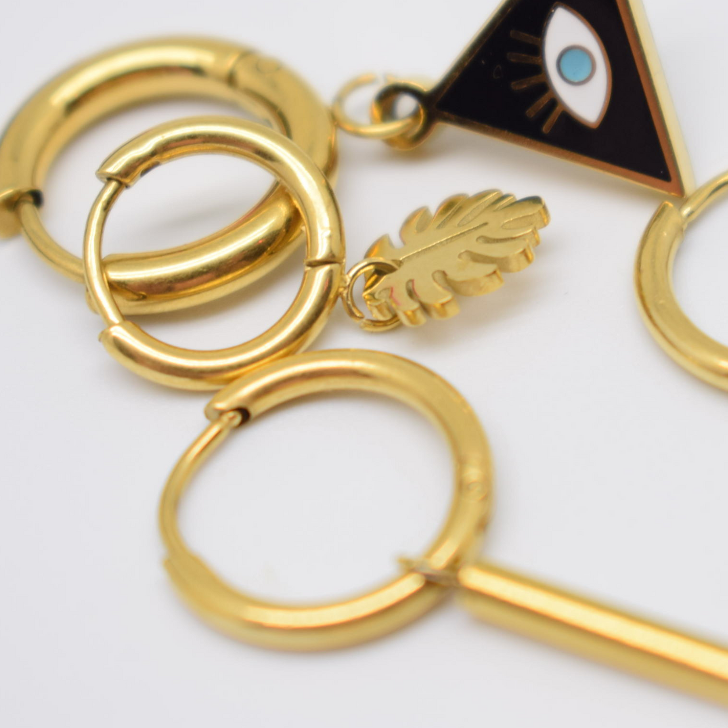 Tropical leaf hoops - Gold - TheEarringCollective